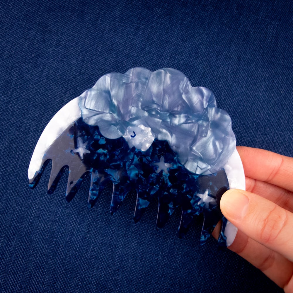 Cosmic Comb by Lisa Junius