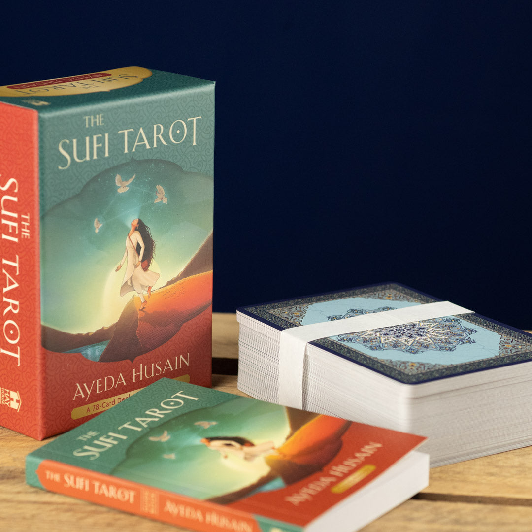 Sufi Tarot card set with packaging on a wooden surface