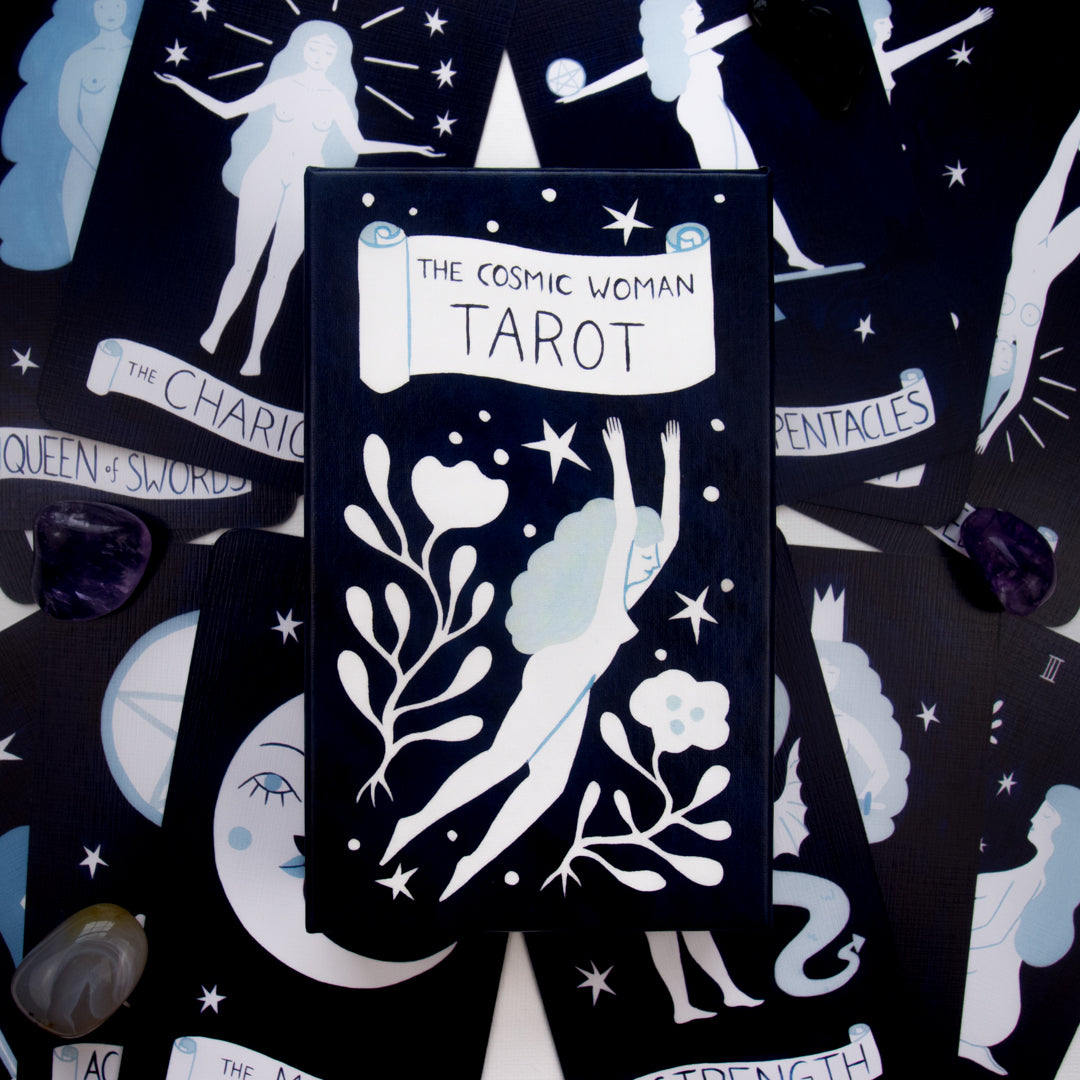 Tarot card deck with 'The Cosmic Woman Tarot' packaging on a matching card background.