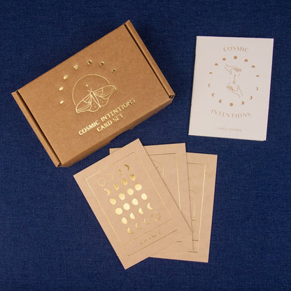 Cosmic Intentions card set with brown box and cards on a blue background