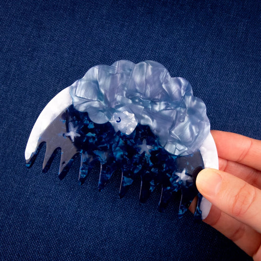 Cosmic Comb by Lisa Junius