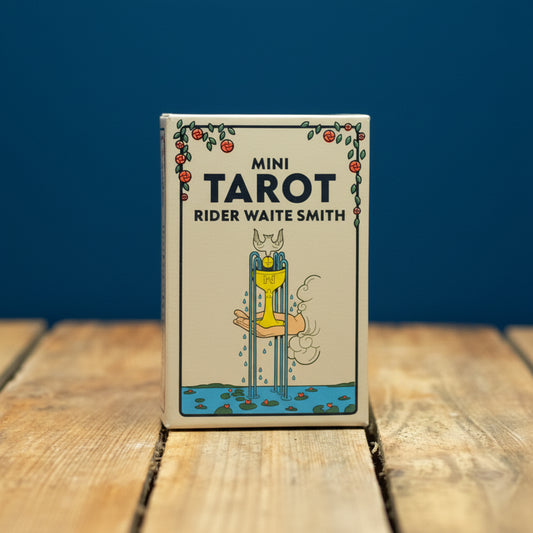 Mini Tarot Rider Waite Smith deck on a wooden surface