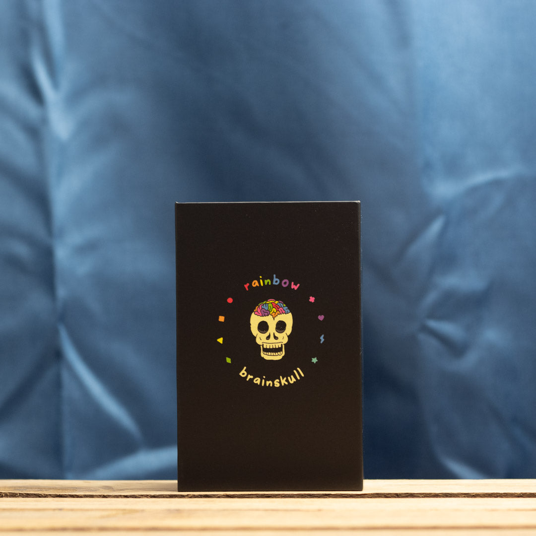 Rainbow Brainskull Oracle Card Set on blue background