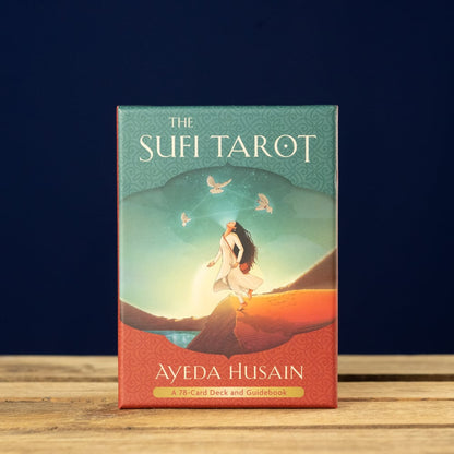 Sufi Tarot card set packaging with a woman and butterfly design on a blue and red background.